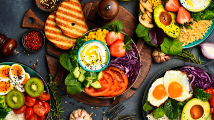 vegan, detox Buddha bowl with tomatoes, cabbage, corn and cheese. Diet food concept.