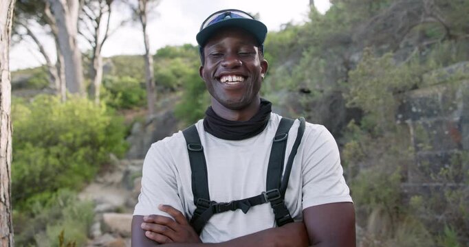 Fitness, face or black man in nature with arms crossed, pride or progress in outdoor workout. Laugh, portrait and hiker with sportswear, trekking exercise or training confidence in body improvement.