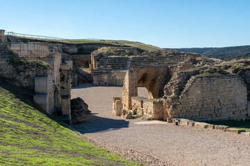 Ancient Roman amphitheatre ruins in the archaeological park of Segobriga in Cuenca, Castilla La Mancha, Spain.
