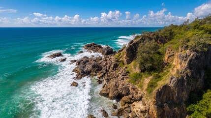 Fototapeta premium Breathtaking Panoramic Drone View of Rugged Cliffside by the Ocean