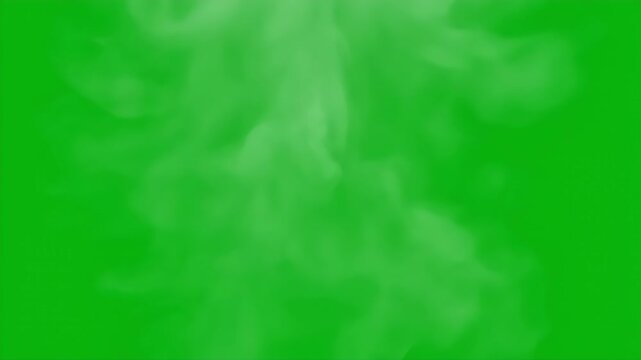 White smoke plume rising and expanding on green screen chroma key 