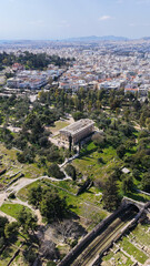 Naklejka premium Aerial drone photo of iconic Temple of Hephaestus in Ancient Agora of Athens historic centre built below Acropolis hill , Attica, Greece