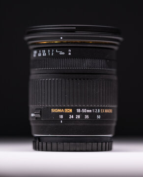 Gothenburg, Sweden - July 22 2024: Sigma DC 18 50mm f 2.8 camera lens standing upright in studio light.