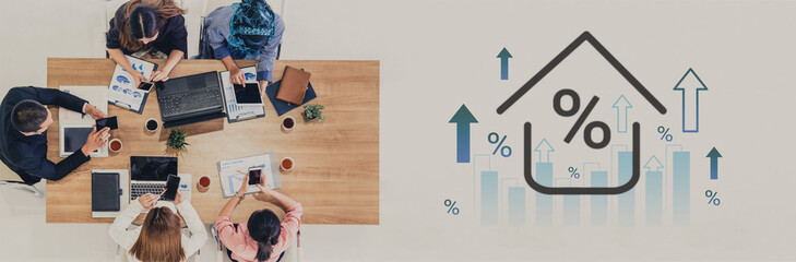 A professional business team collaborates in a modern office setting, discussing strategies for growth while analyzing financial charts and data trends. Gantry