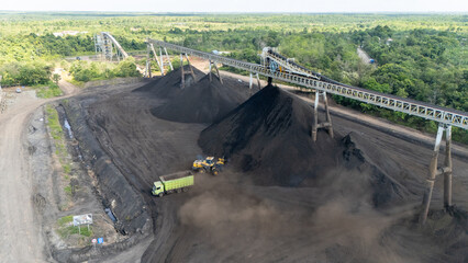 Drone footage from a coal mining site in South Kalimantan shows trucks and heavy equipment in action © A Denny Syahputra