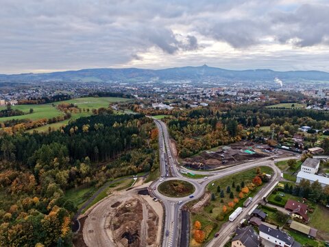 development site with earth and tools, landscape showing ongoing valley roundabout development