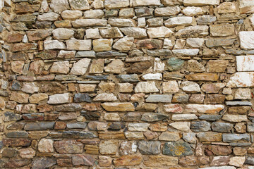 Obraz premium Ancient stone wall building rustic exterior texture