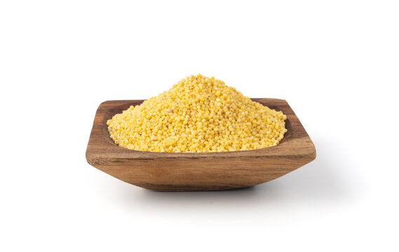 Raw millet grains pile isolated. Little yellow cereal, natural foxtail small seeds