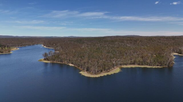 Barossa Reservoir Reserve, Williamstown, South Australia &ndash; 4K aerial drone footage of Whispering Wall dam, blue reservoir lake and surrounding forest landscape