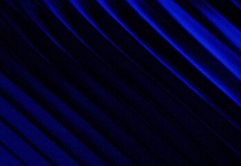 Diagonal deep blue velvet fabric texture with dramatic folds and moody lighting