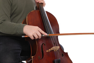 Little boy playing violoncello on white background, closeup