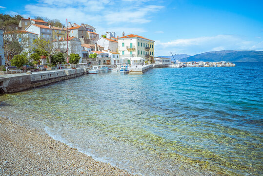 Valun, Cres Island, Croatia: Coastal town with boats and clear blue water