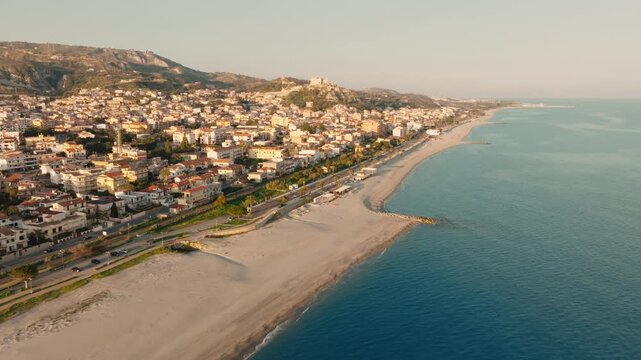 The town of Roccella Ionica in Calabria during a relaxing pre summer sunset