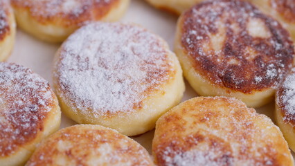 Pancakes with sugar, Closeup of warm rustic cottage cheese pancakes dusted with powder, Delicious homemade cottage cheese pancakes topped with powdered sugar and aroma