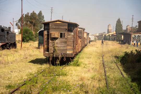 Old, abandoned, wooden box cars on the tracks at the railway station in Asmara, Eritrea