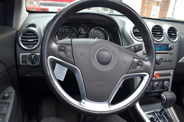 Mechanic tools and car engine in repair workshop