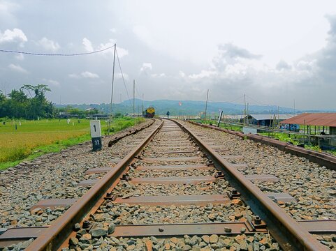 ANTIQUE TRAIN RAILS ALONG RAWA PENING LAKE IN THE AMBARAWA OLD TRAIN STATION AREA