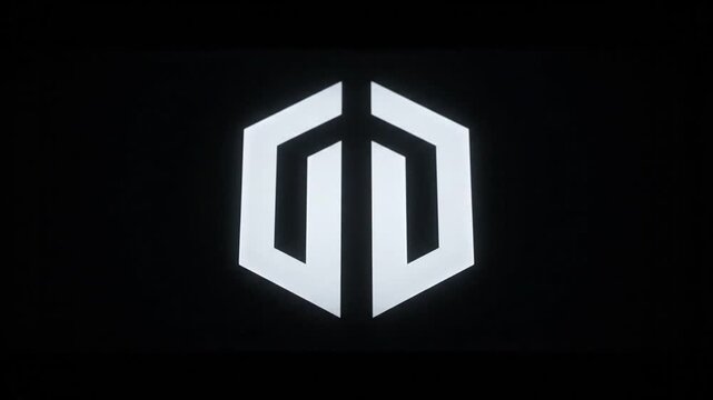 Glowing Hexagonal Logo on Black Background.