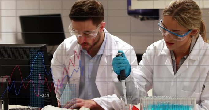 Pipetting lab-coated gloved tech adding blue liquid into tube rack at lab bench, male noting data