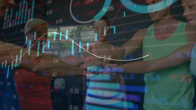 Five teammates forming hand stack in gym, lifting arms overhead celebrating as stock charts overlay