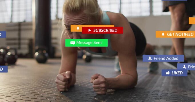 Notifications popping up, woman holding forearm plank lifting chest to resist social distraction