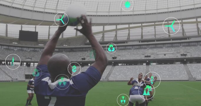 Player 2 watching thrower launching rugby pass lifting jumper securing control green icons drifting