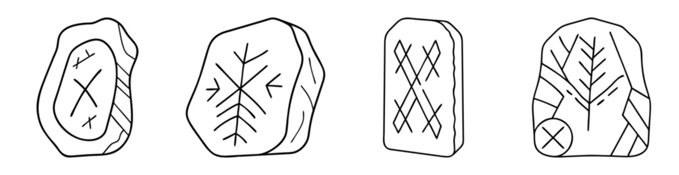 Four carved stones with different runic symbols for divination or fortune telling