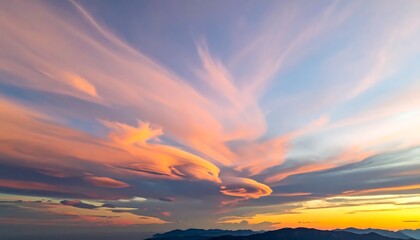 Vibrant sunset over mountain range with colorful sky