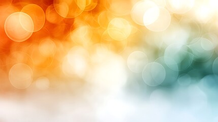 Obraz premium Colorful blurred background with bokeh effect, orange and teal gradient tones, light play