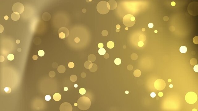 Blurred gold background with luminous bokeh lights. Suitable for luxury designs, festive events, holiday promotions, glamourous presentations.