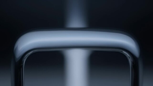 Closeup of a rounded square object with reflection and soft light