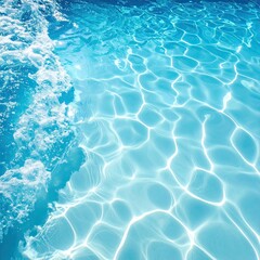 Obraz premium Rippling, sun-dappled aqua surface with foamy edge, abstract