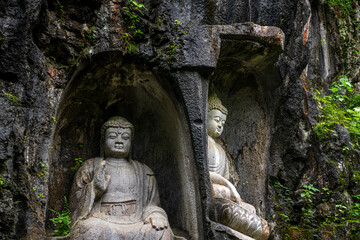 HangZhou, China, the stone statue the eighteen Arhats made in Northern Song DynastyPeak Flown From Afar Fei Lai Fen, Ling Jiu Feng , stands next to Lingyin Temple