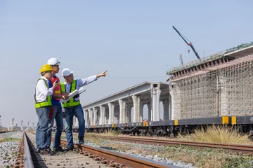 Engineers Supervising High Speed Railway Construction Site © kamonrat