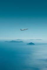 Fototapeta premium A serene view of an airplane soaring above calm waters and distant islands, capturing the essence of travel and adventure.