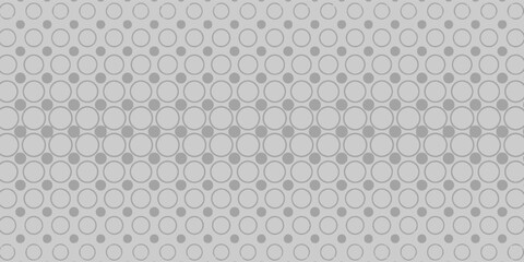 Fototapeta premium Abstract background with minimalist grey and silver repeating circle patterns.