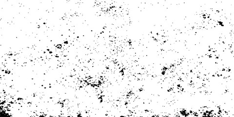 Obraz premium A grunge black ink splat and liquid paint splatter create a textured vector pattern design against a minimalist black and white wallpaper background