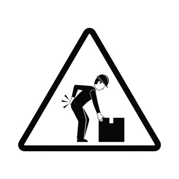 Warning symbol indicating the risk of back injury from improper lifting of a heavy box by a person