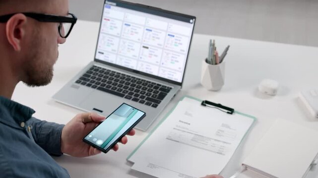 Accountant Using Smartphone To Take A Clear Photo