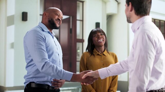 Neighborhood Integration: African Couple Meeting Neighbor