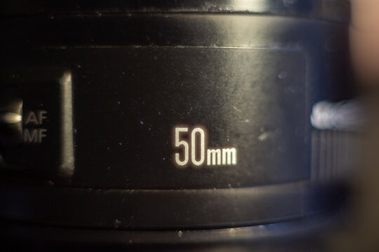 Fifty millimeter lens detail with autofocus manual focus switch for professional photography equipment
