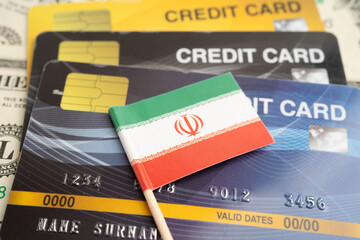 Obraz premium Iran flag on credit card, finance economy trading shopping online business.