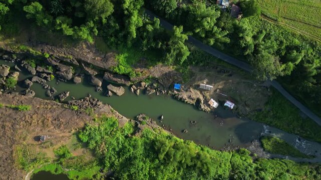 Establishing shot of Bucal Tulay river landscape featuring endless water flow and massive rock formations at Maragondon Cavite Philippines
