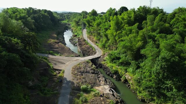Forward motion revealing the road and river flow at Bucal Tulay Maragondon Cavite Philippines