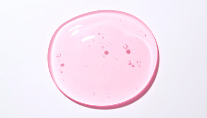 Pink cosmetic gel texture isolated on white background, moisturizing skincare serum bubble texture