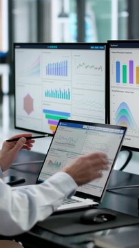 Women In The Office Analyzing Data