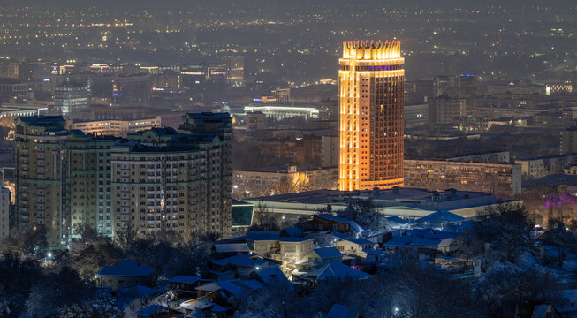 A view of Kazakhstan's largest city, Almaty, from Mount Kok Tobe early in the morning after a snowfall.