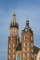Fototapeta premium Two Gothic towers of St. Mary's Basilica in Krakow