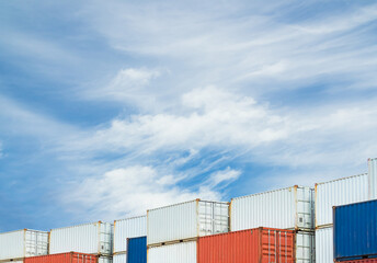 Obraz premium Cargo ship container goods export import international transport on blue sky background, warehouse industry business logistics transportation harbor port industrial shipping terminal cargo ship.