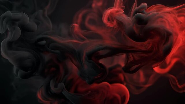 Abstract red and black smoke swirling with vibrant fluid motion on dark background